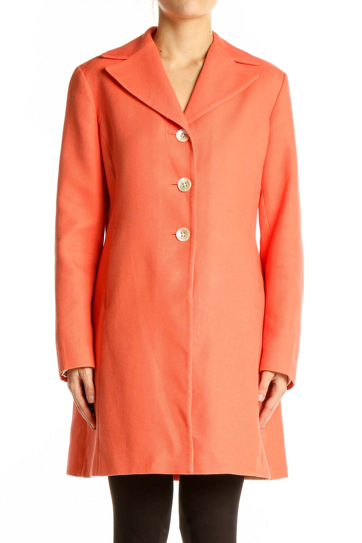 Front view of coral Ann Taylor button-front coat on model