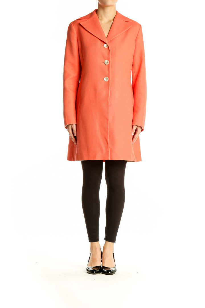 Front view of coral Ann Taylor button-front coat on model