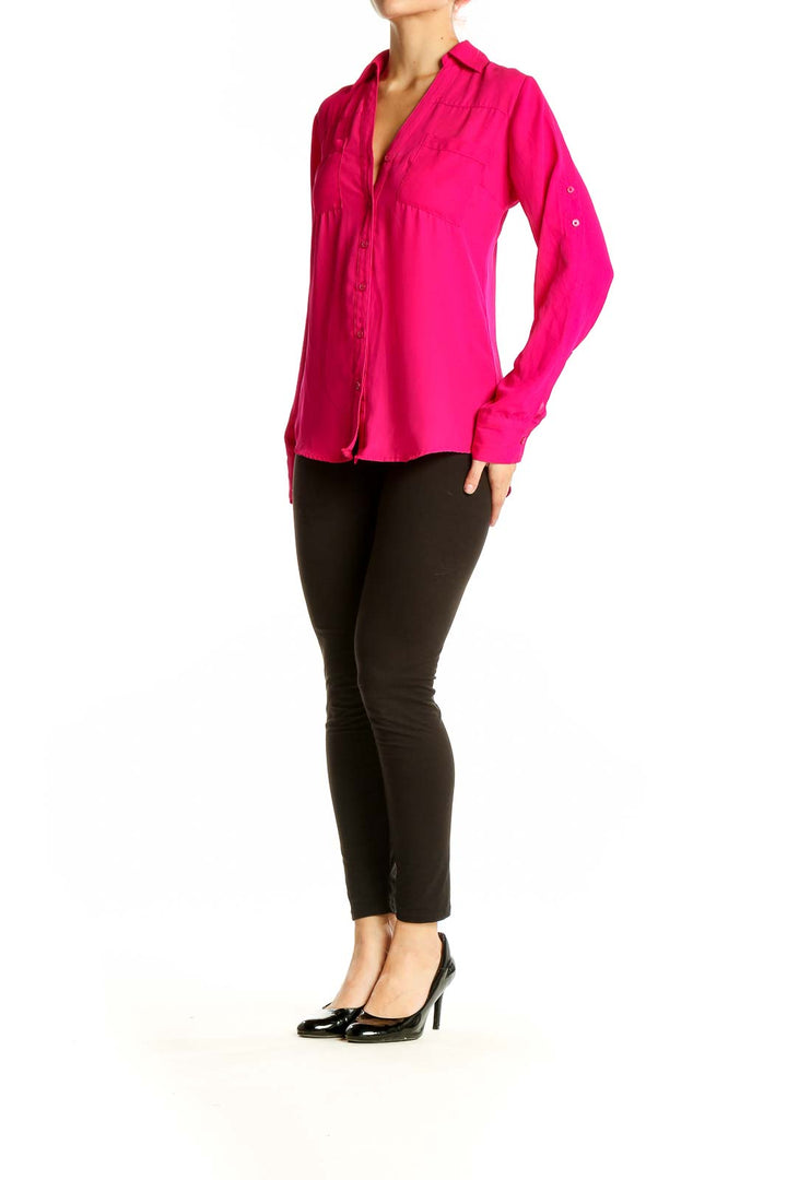 Front view of hot pink Express button-down blouse