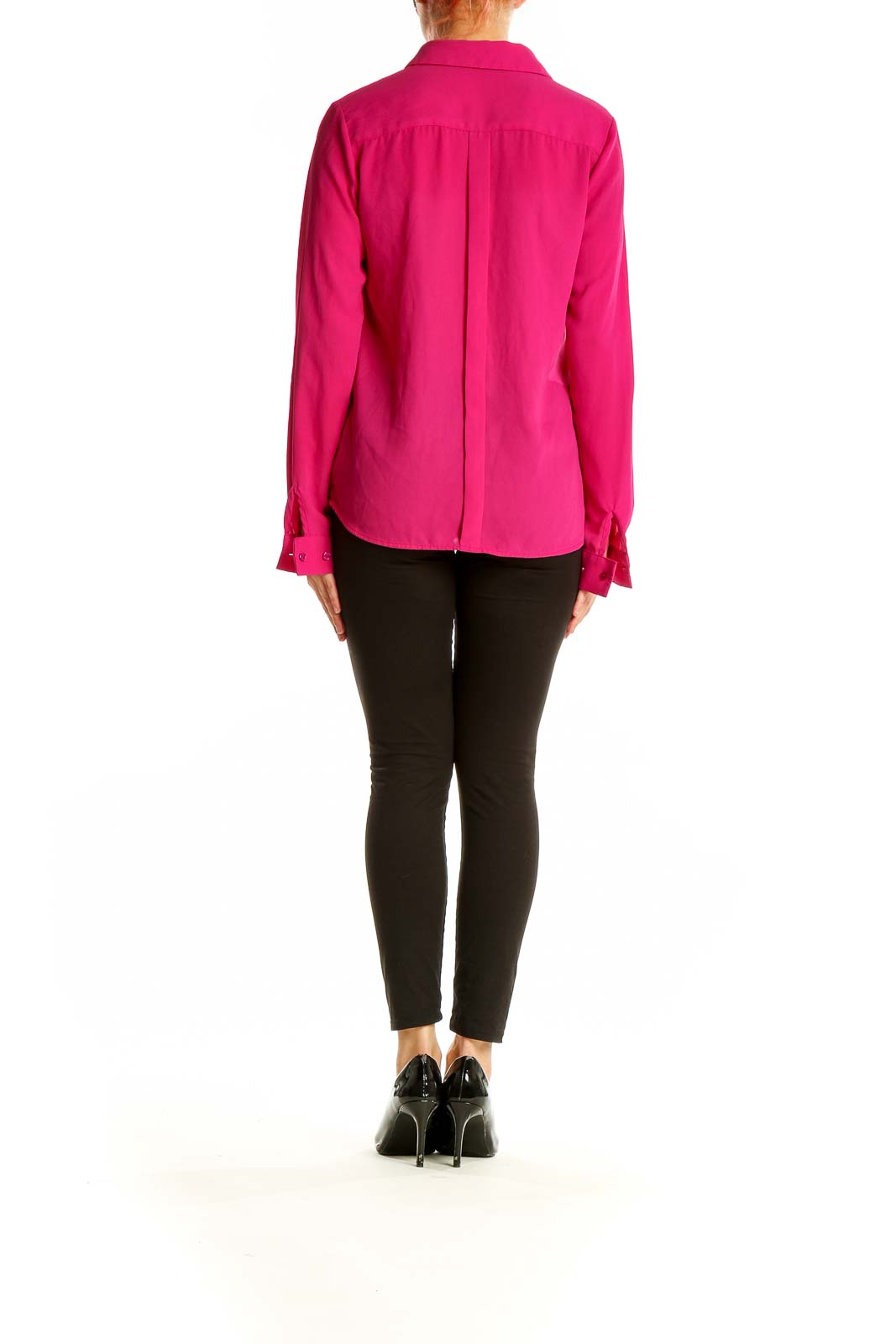 Side view of hot pink button-down blouse from The Limited on model