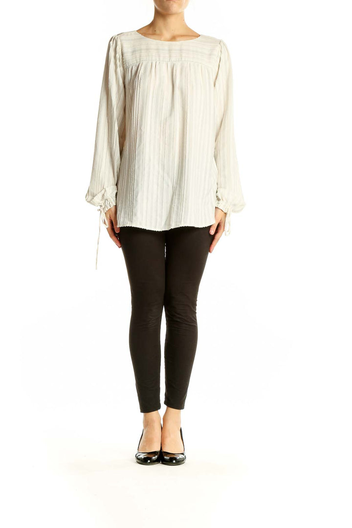 Front view of LOFT white striped flowy polyester blouse with tie-cuff sleeves