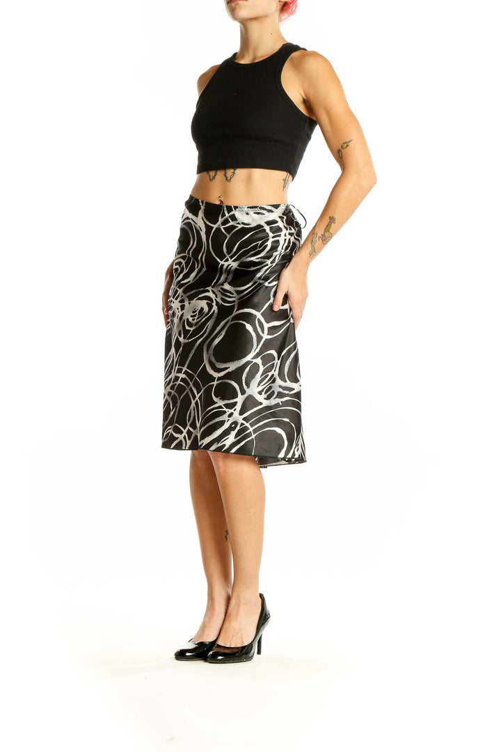 Front view of Wrapper Black and White Swirl Pattern Midi Skirt