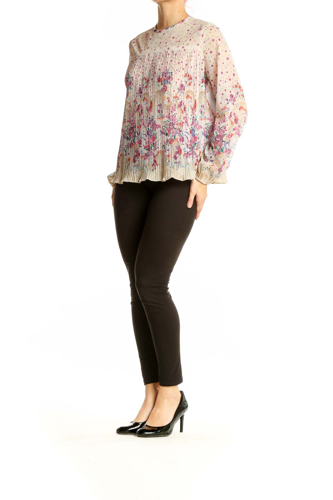 Front view of SilkRoll beige floral pleated long sleeve blouse with polka dot background