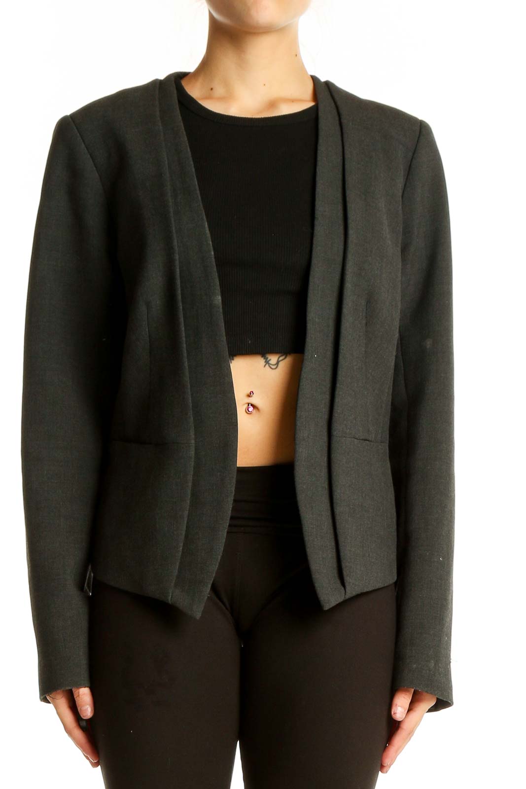 Front view of Trina Turk dark green open-front blazer on model