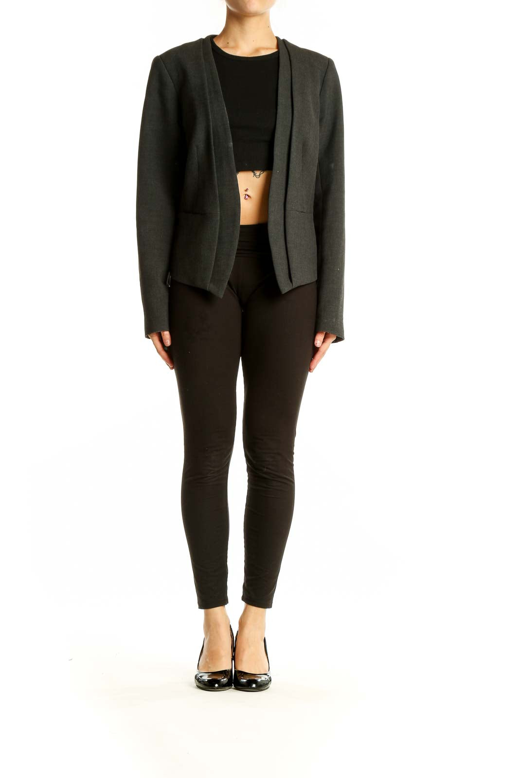 Front view of Trina Turk dark green open-front blazer on model