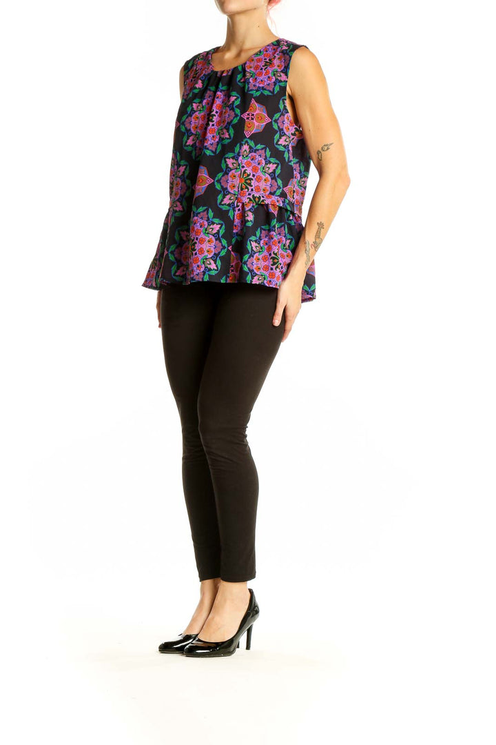 Front view of J.Crew black sleeveless blouse with colorful floral print