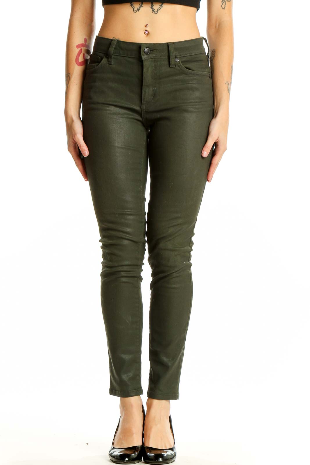 Front view of Joe's olive green skinny pants on model