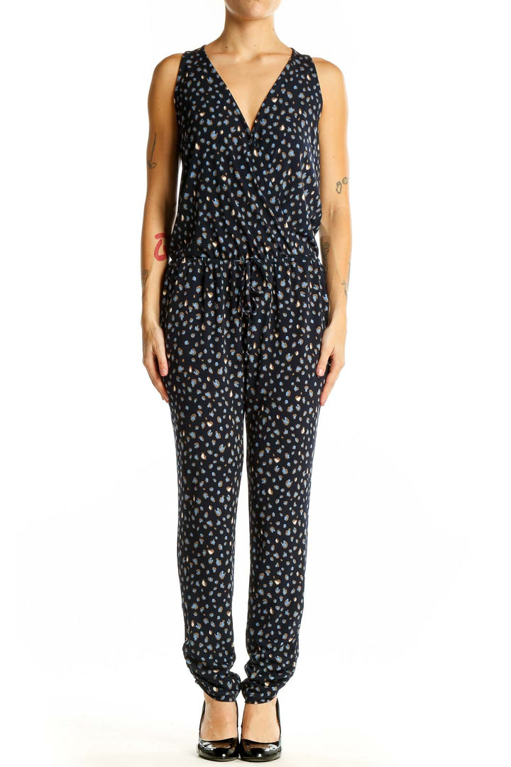 Front view of Veronica M black polka dot sleeveless jumpsuit