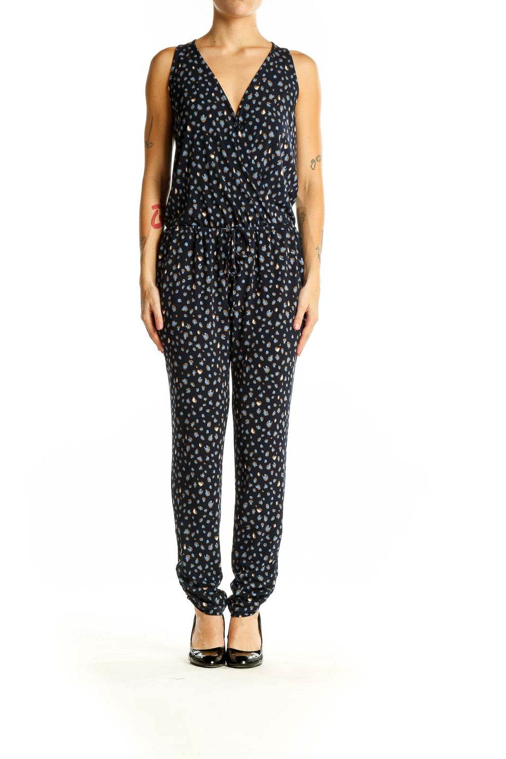 Front view of Veronica M black polka dot sleeveless jumpsuit