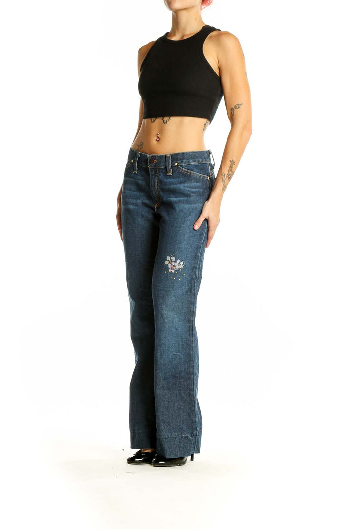 Front view of Adriano Goldschmied blue wide-leg jeans with floral embroidery