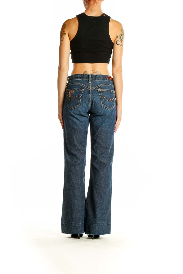 Side view of model wearing Adriano Goldschmied blue wide-leg jeans