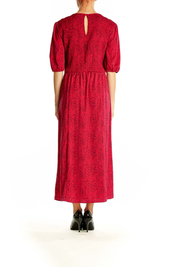 Side view of red floral puff sleeve midi dress by Popsugar