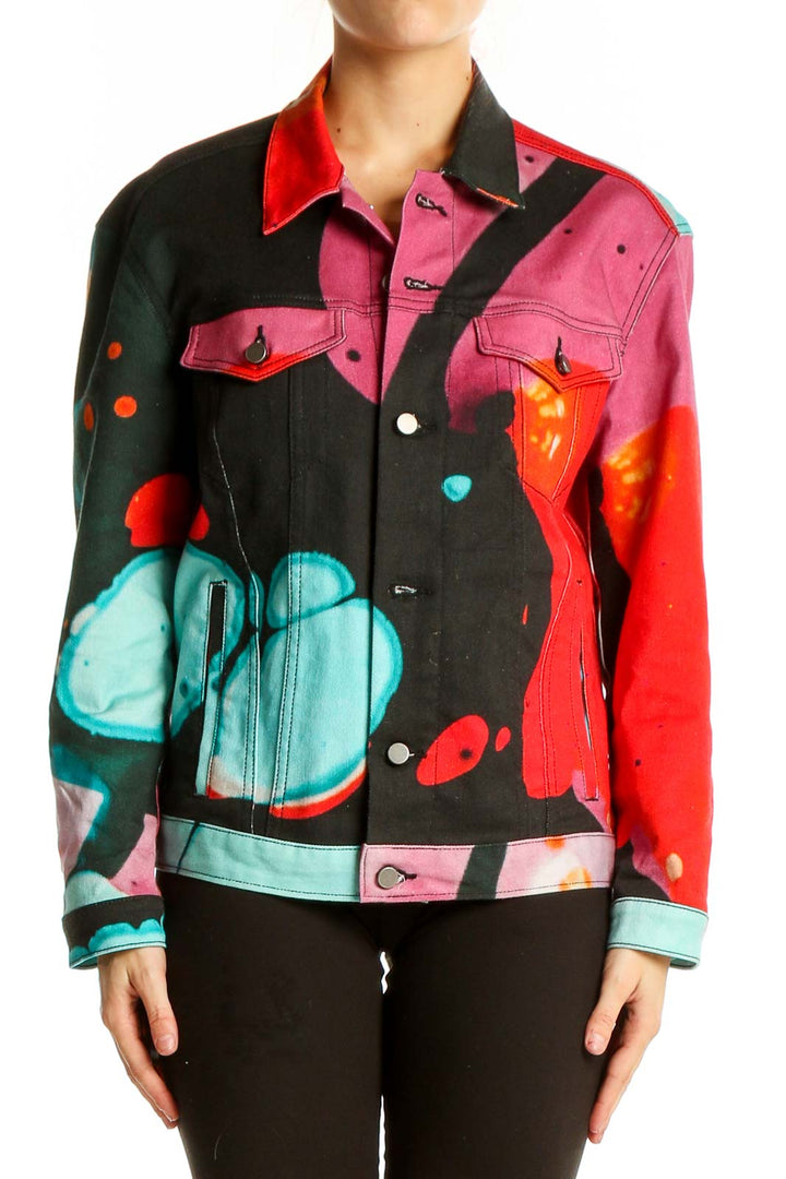 Front view of The Kit's multicolor abstract art denim jacket with vibrant red, pink, black, and turquoise design