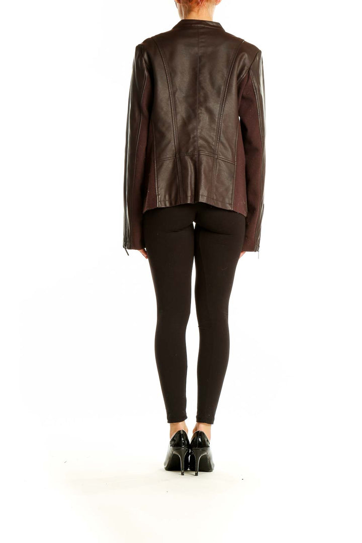 Side view of Mo-Ka brown leather zip-up jacket on model