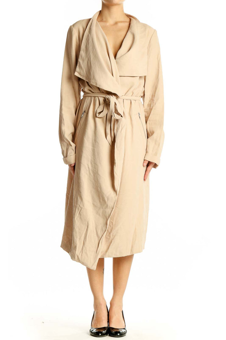 Front view of Express beige trench coat with draped collar and belt