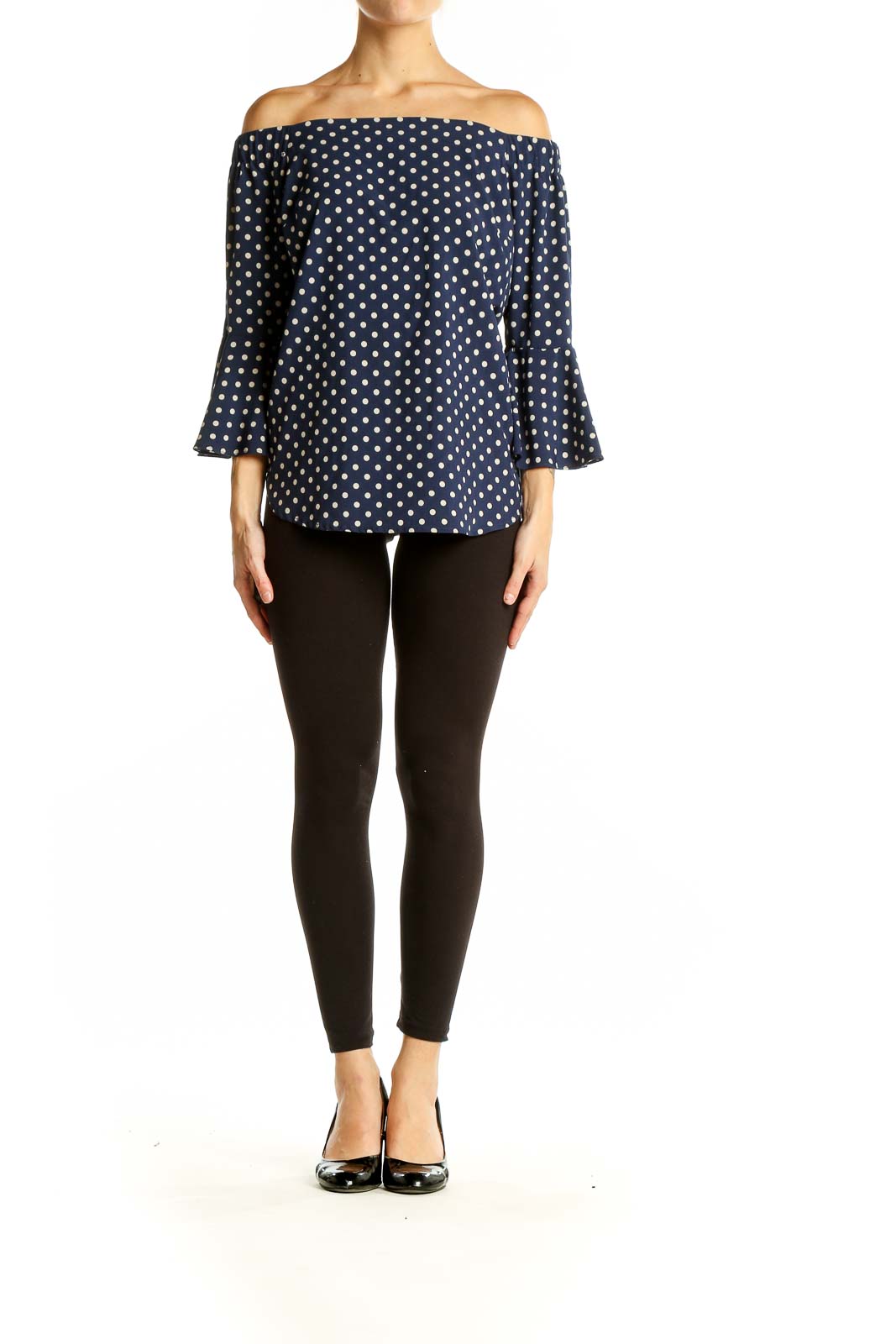 Front view of Camilla Tree navy polka dot off-shoulder top with bell sleeves