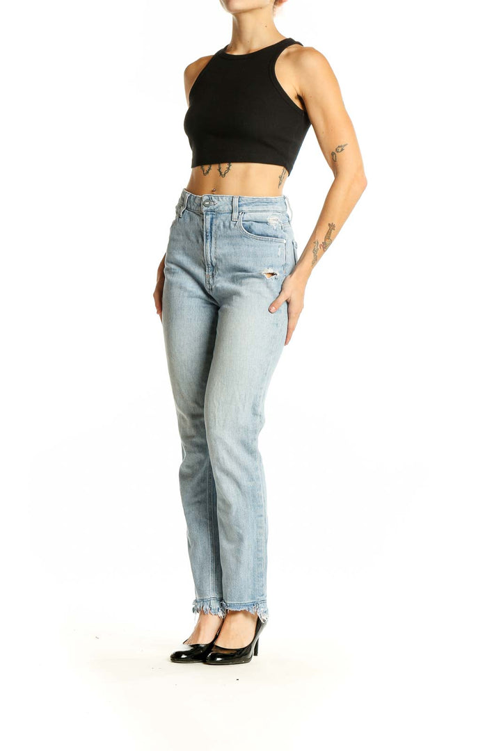 Front view of Paige light blue high-waisted straight jeans with distressed details