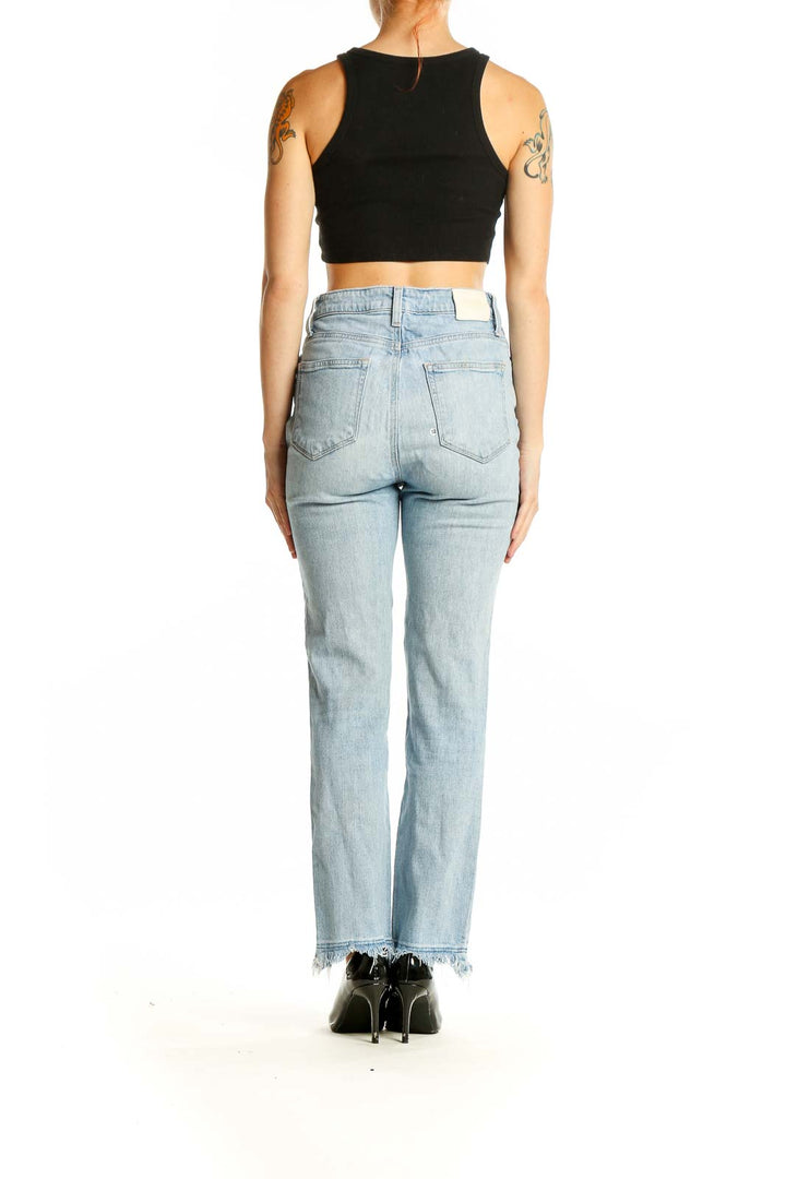 Back view of Paige light blue high-waisted straight jeans with frayed hem