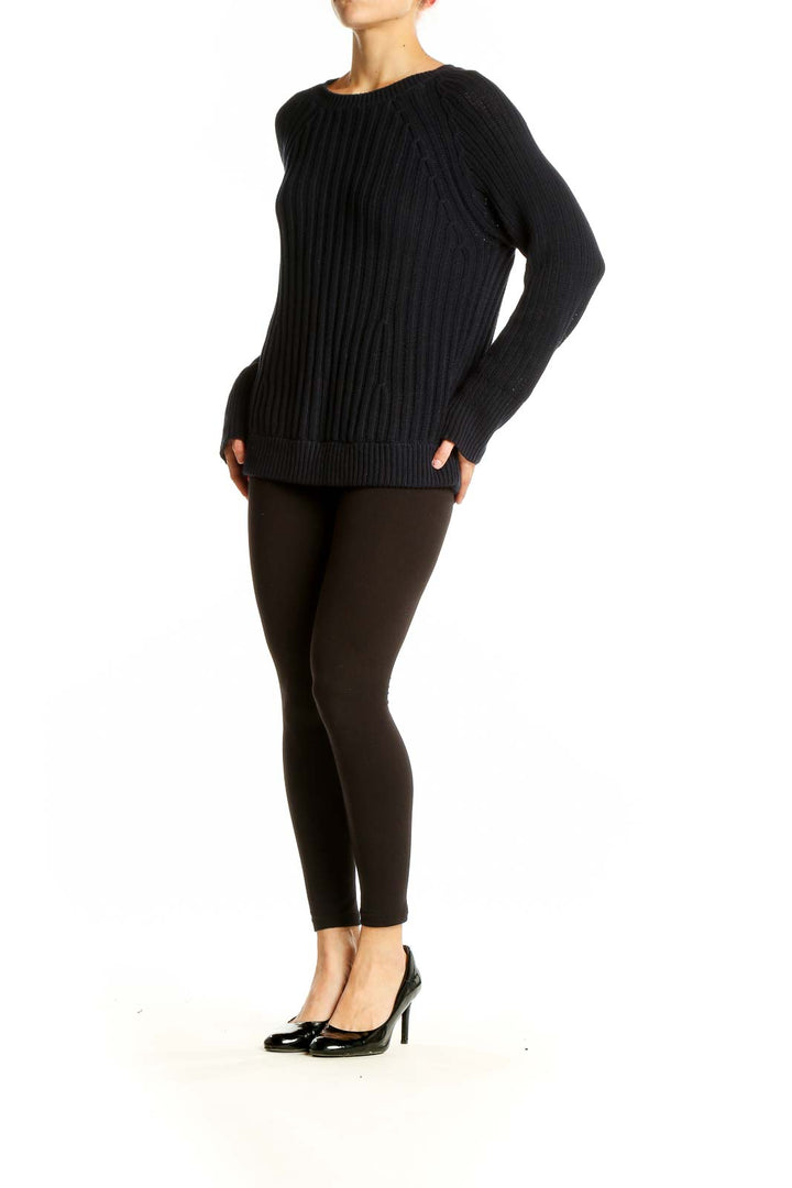 Front view of J.Crew black ribbed cotton crewneck sweater on model