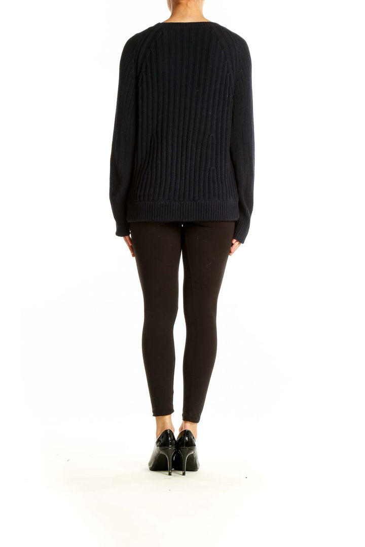 Back view of J.Crew black ribbed cotton crewneck sweater on model