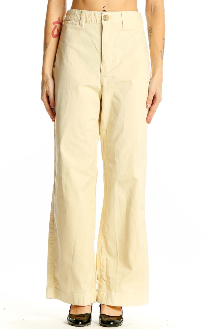 Front view of cream Gap wide-leg pants on model