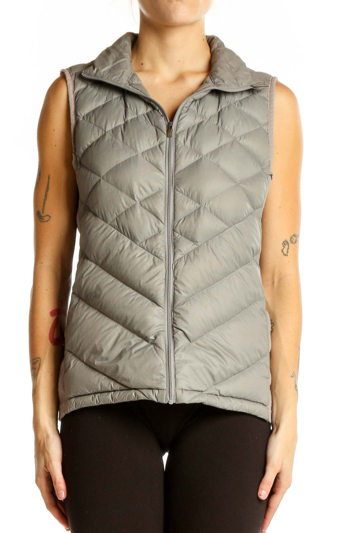 Front view of gray quilted puffer vest by Lucy with chevron pattern