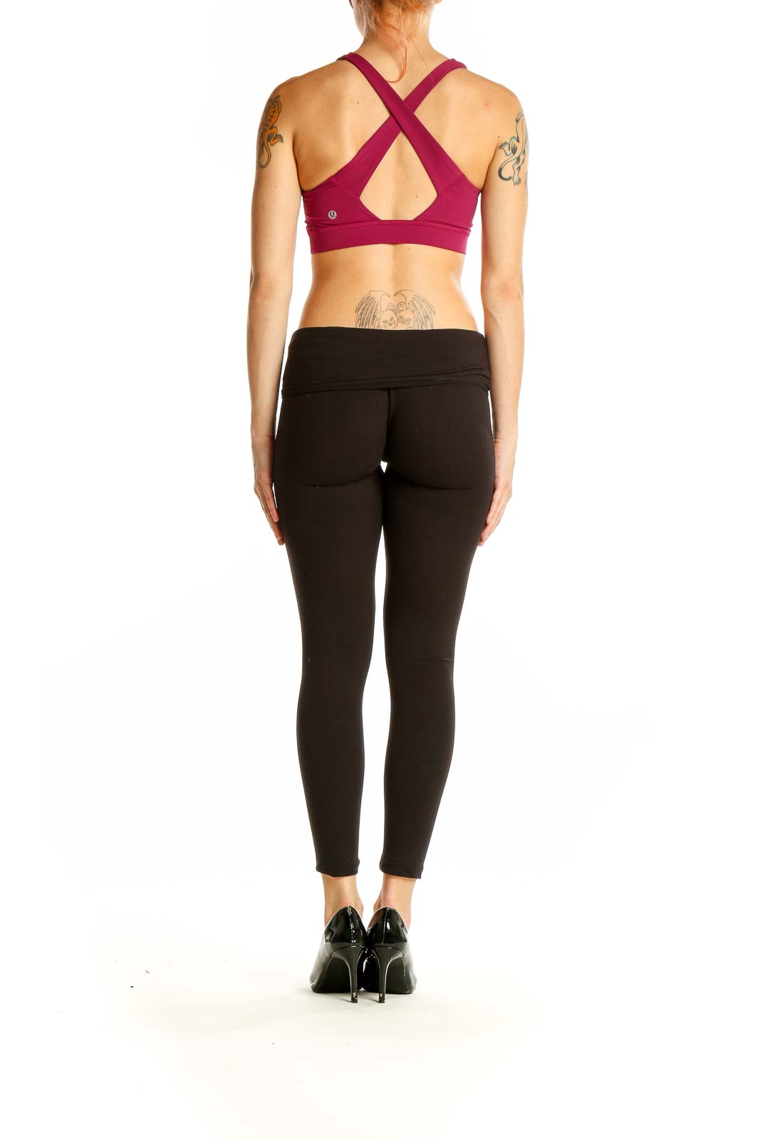 Side view of burgundy Lululemon racerback sports bra showing racerback design