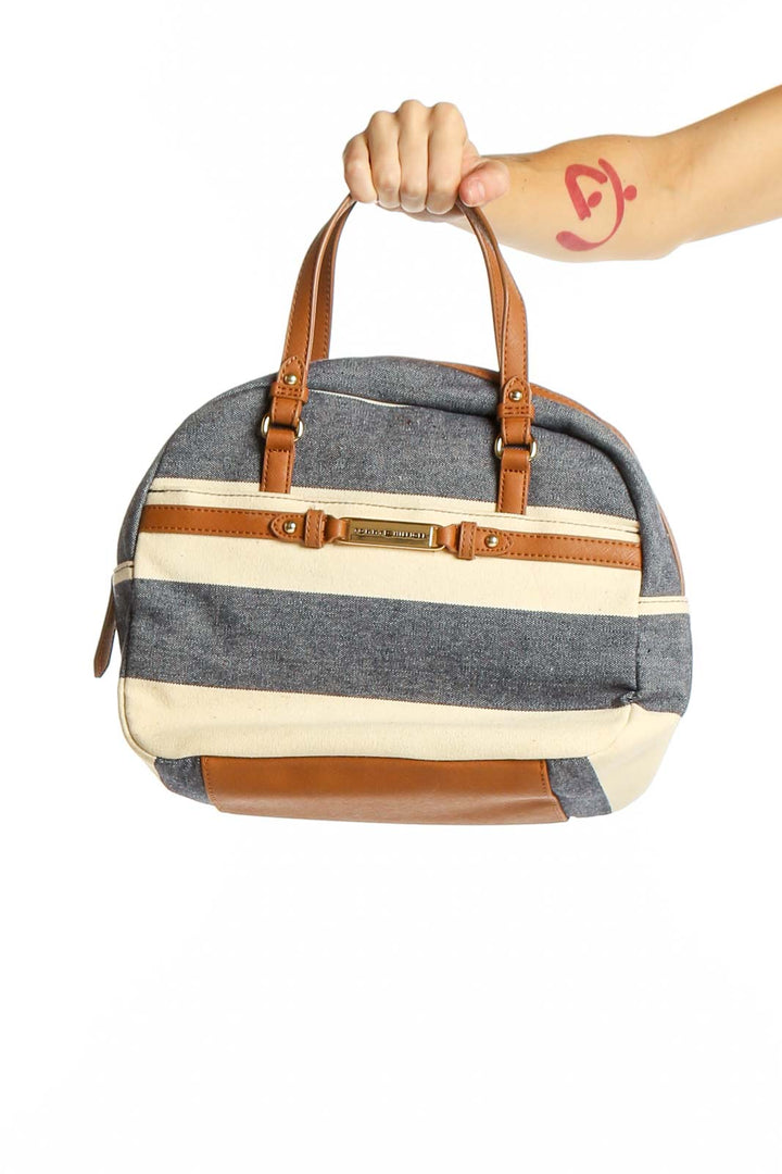 Front view of Tommy Hilfiger gray and white striped satchel with leather handles