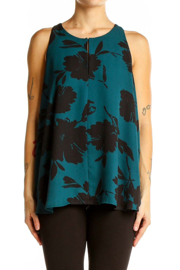 Front view of teal LOFT sleeveless top with black floral print