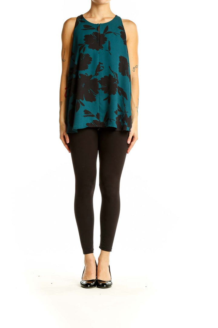 Front view of teal LOFT sleeveless top with black floral print