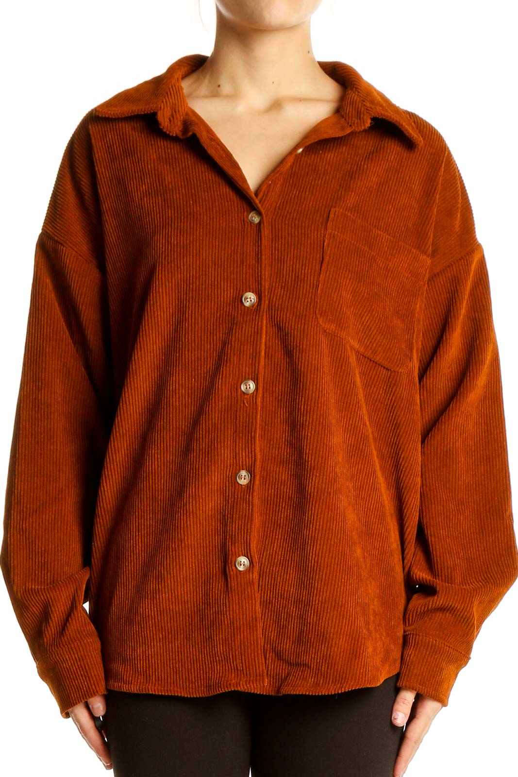 Front view of rust-colored corduroy oversized button-down shirt by SilkRoll