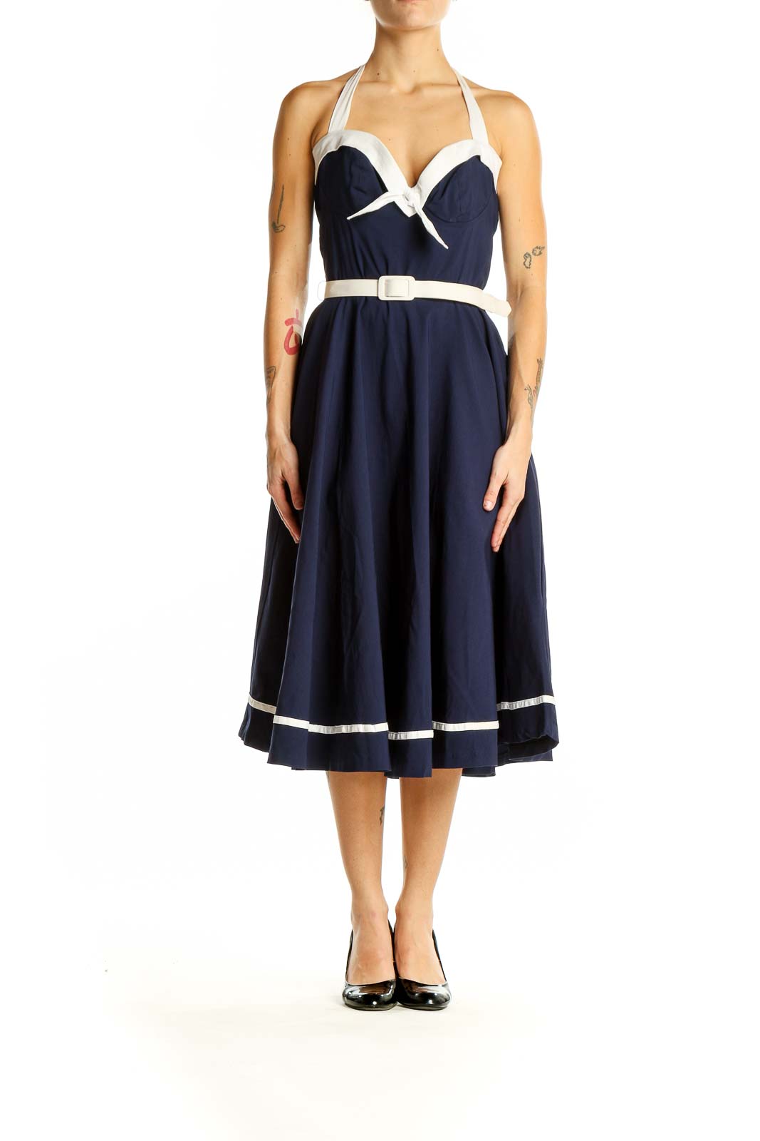 Front view of navy Pinup Couture halter swing dress with white trim and belt