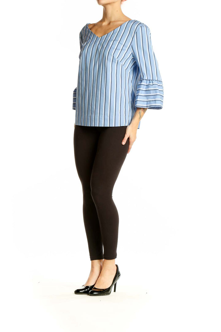 Front view of Blue Striped Bell Sleeve Top from White House Black Market