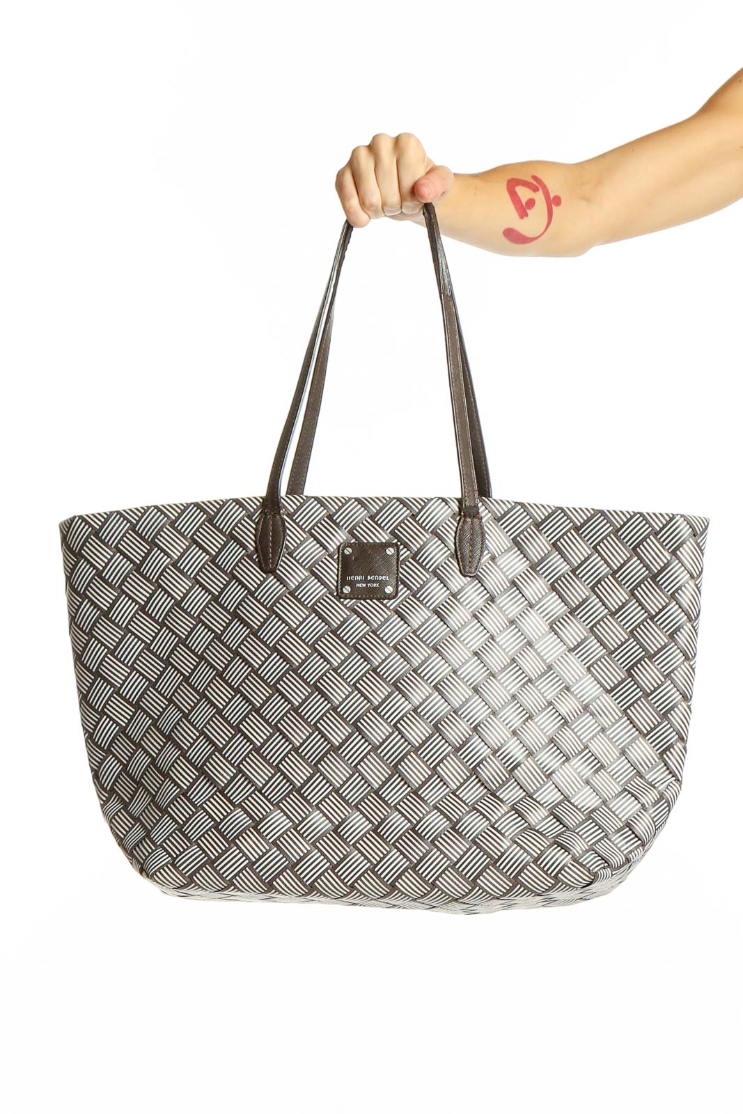 Front view of Henri Bendel gray woven pattern tote bag