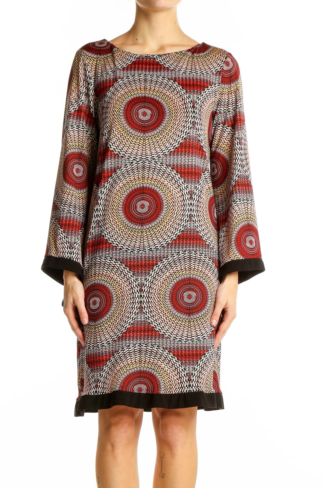 Front view of Emma & Michele red circular pattern shift dress