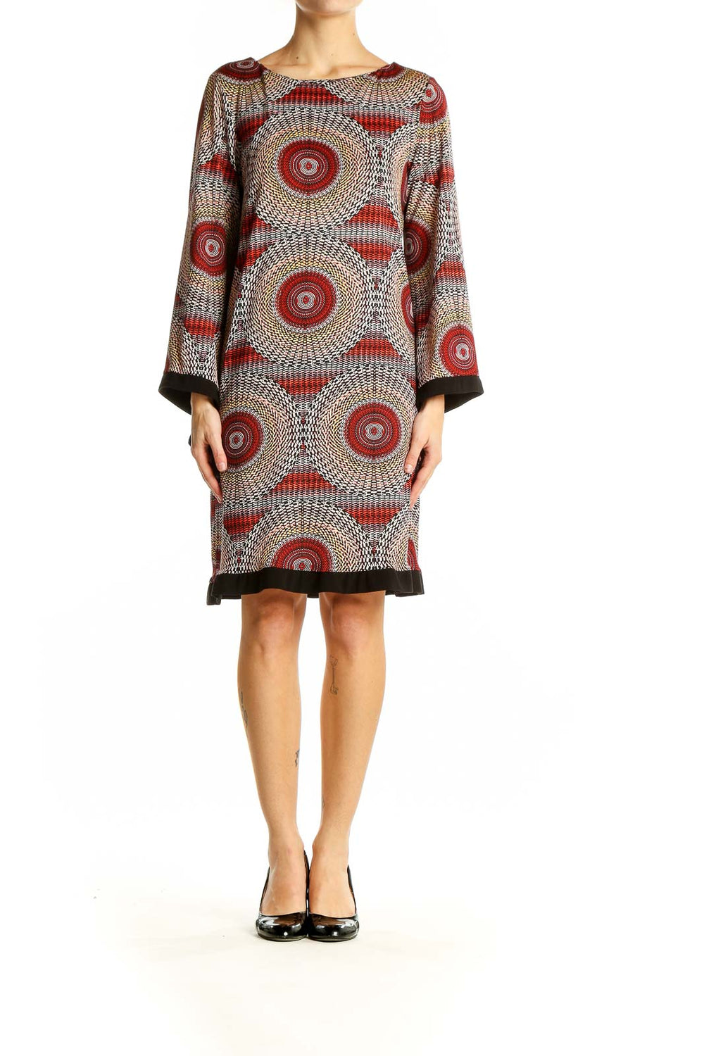 Front view of Emma & Michele red circular pattern shift dress