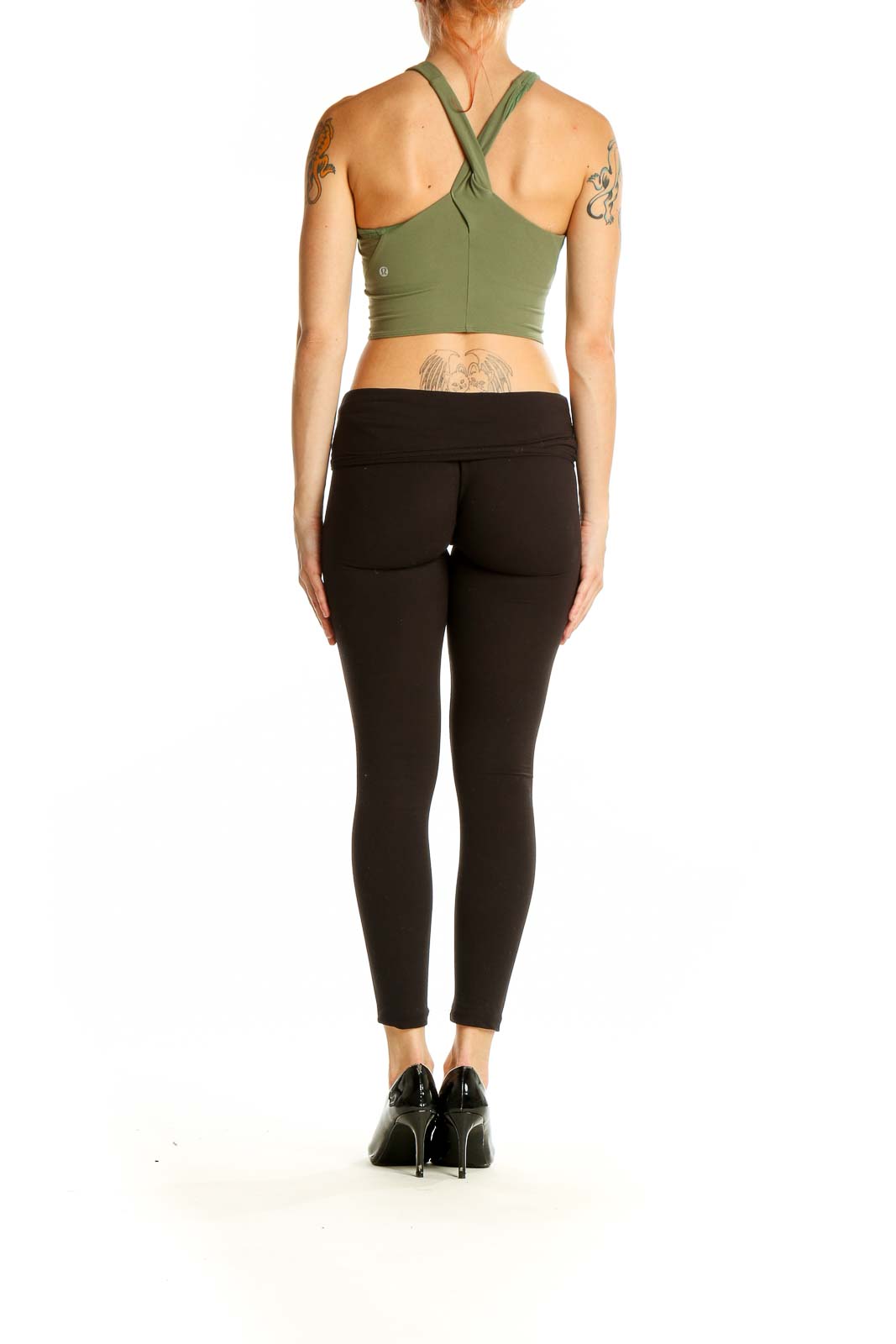 Side view of olive green Lululemon cropped workout top showing racerback design