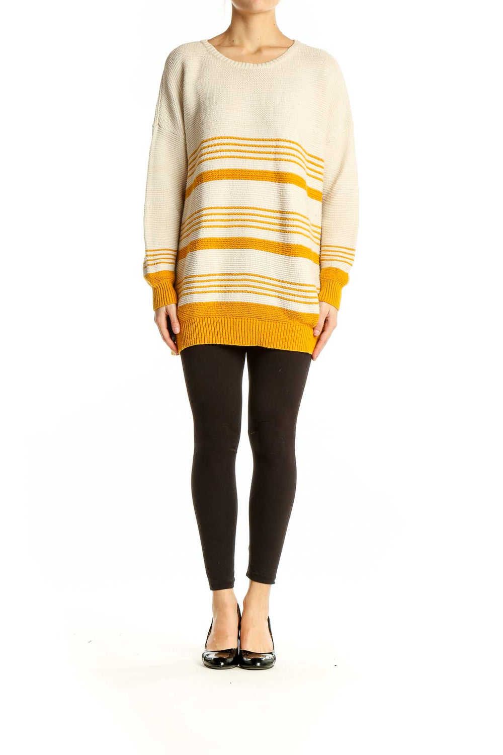 Front view of BDG cream and yellow striped oversized sweater