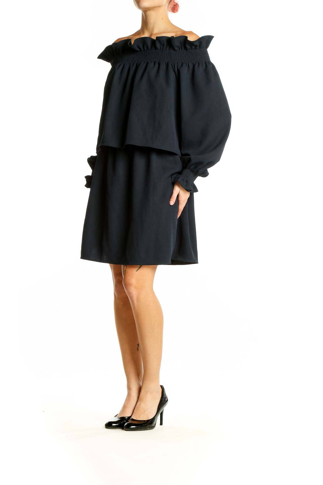 Front view of black off-shoulder ruffled mini dress by Diane von Furstenberg