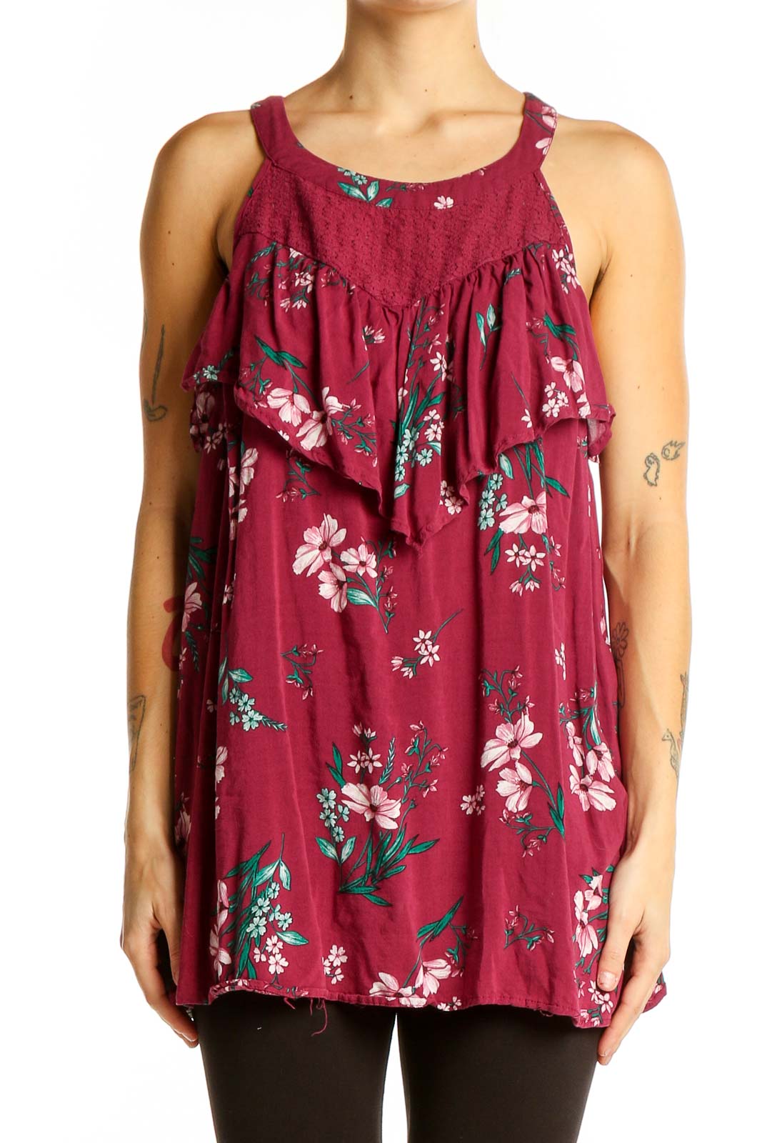 Front view of Torrid burgundy floral tank top with ruffle detail