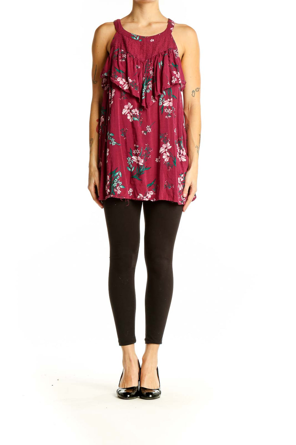 Front view of Torrid burgundy floral tank top with ruffle detail