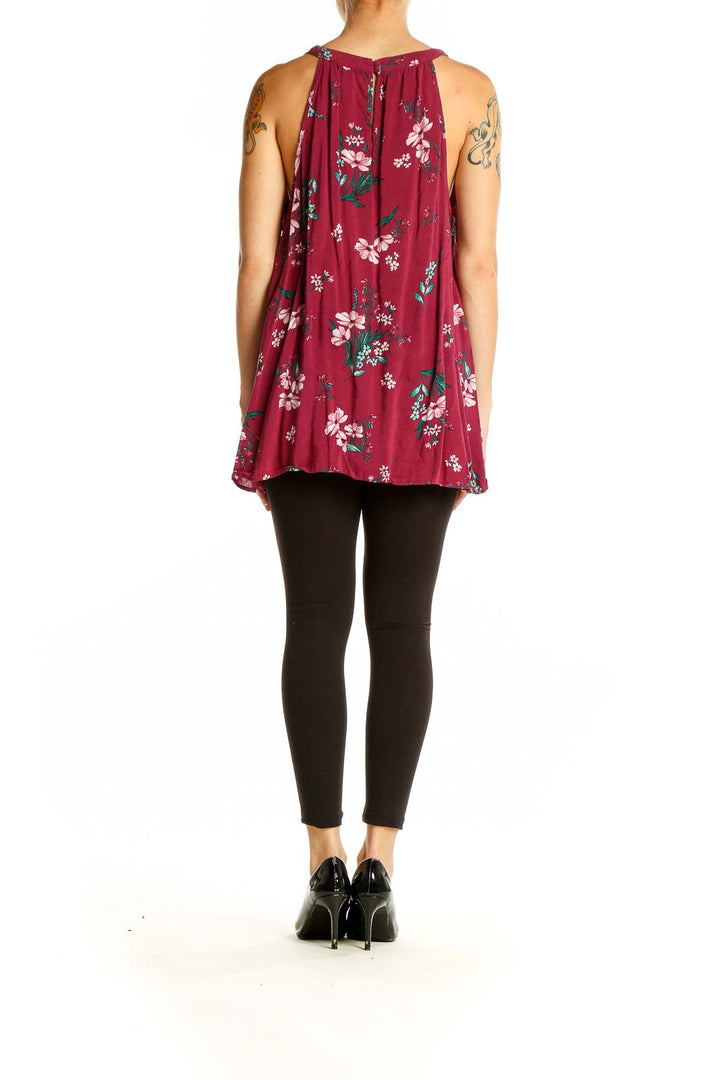 Side view of Torrid burgundy floral tank top showing flowy silhouette