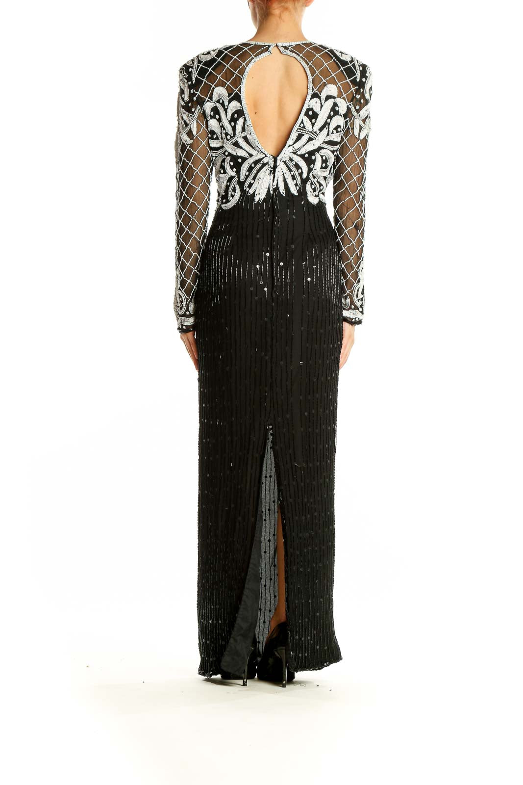 Back view of Lauren Kazan black and white embellished silk gown showing full-length design