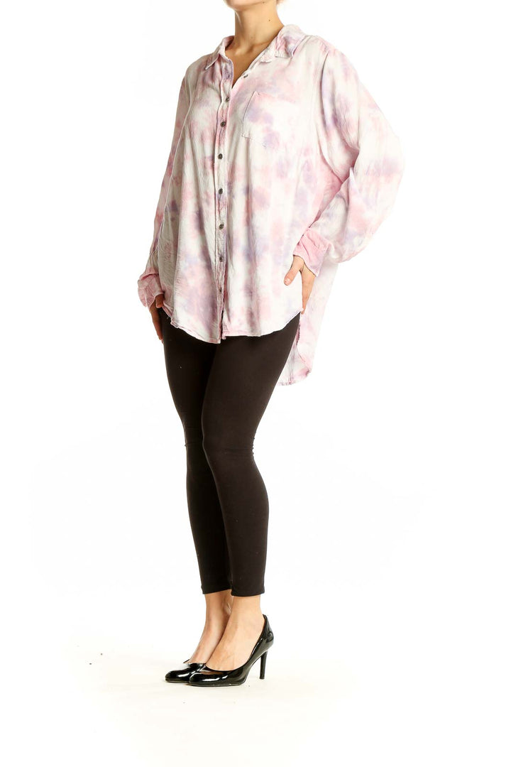 Front view of Torrid pink tie-dye rayon button-up shirt