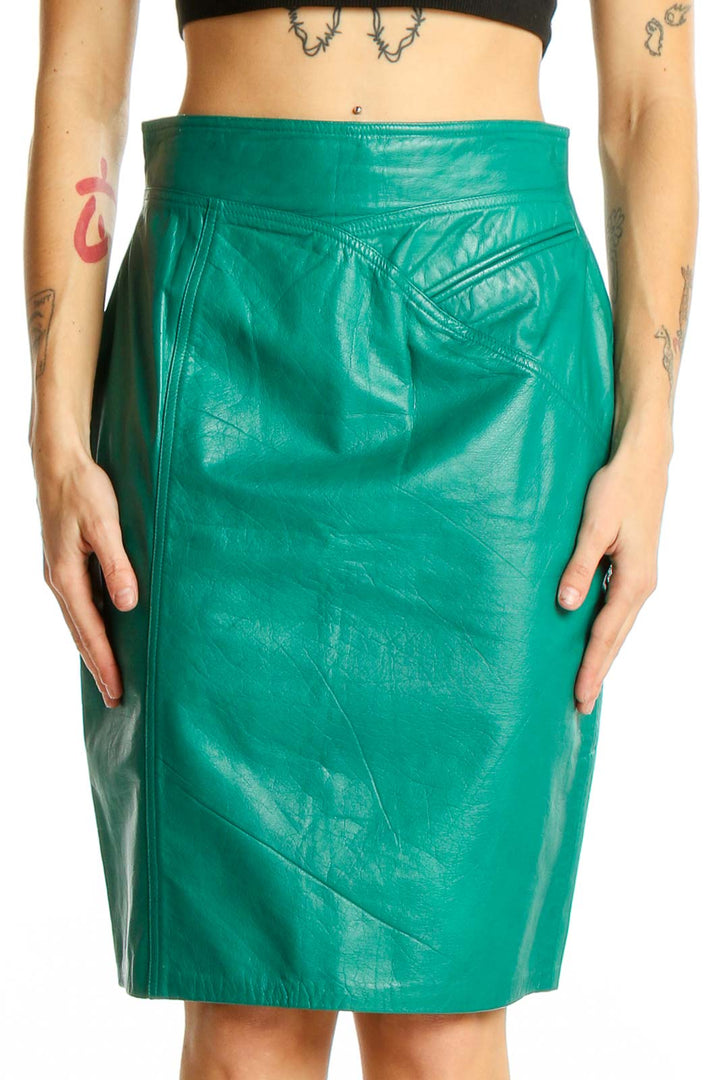 Front view of green leather pencil skirt by JOSEPH HO