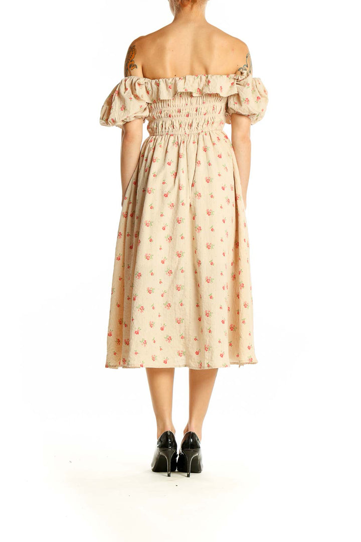 Back view of SilkRoll beige floral off-shoulder midi dress showing full silhouette