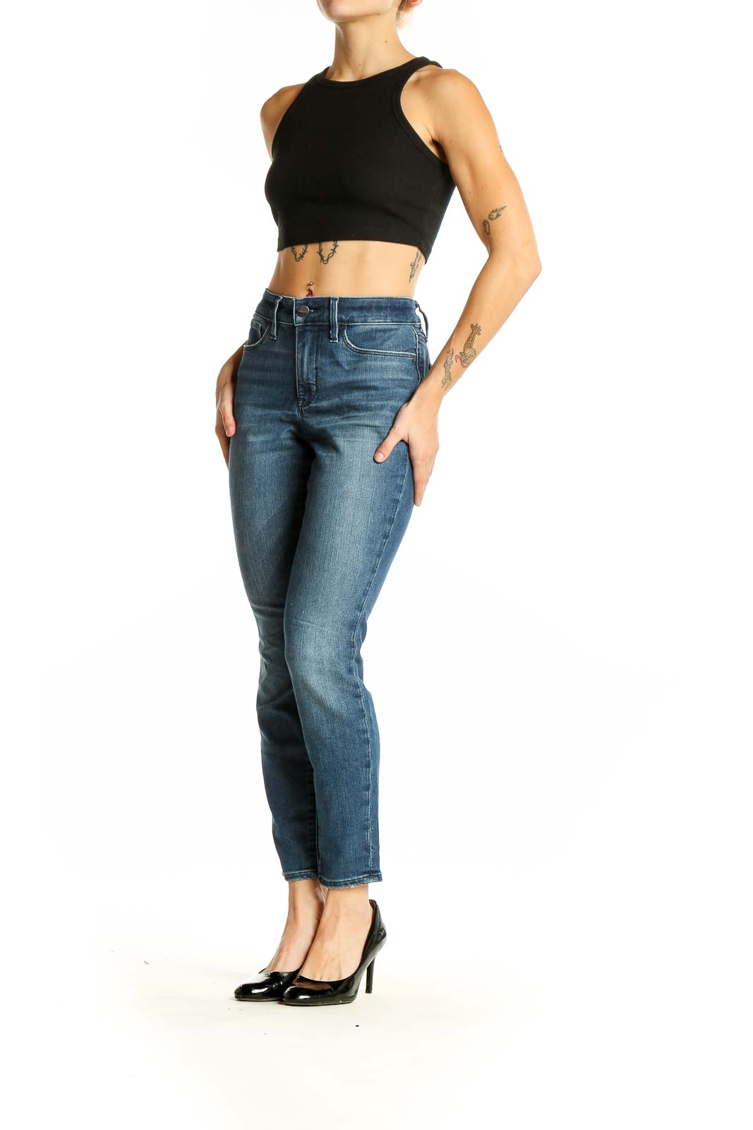 Front view of Athleta blue slim fit ankle-length jeans on model