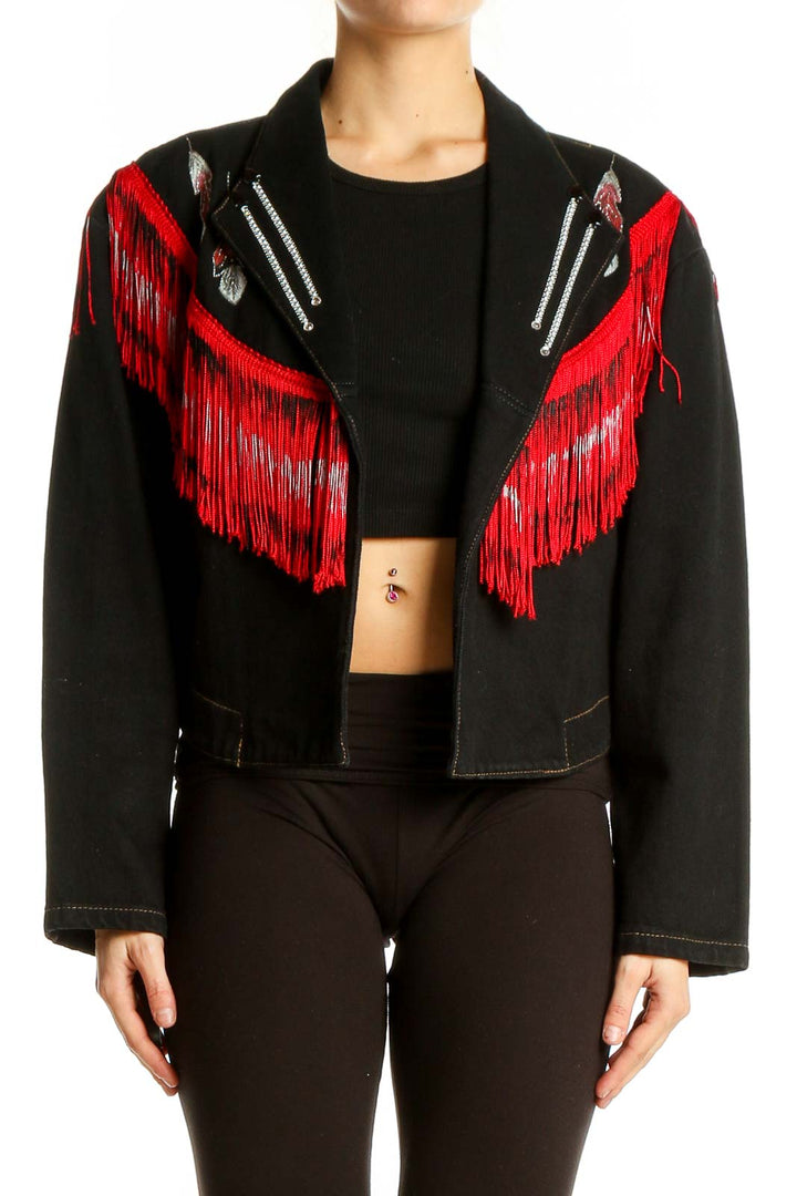 Front view of Wanted black denim jacket with red fringe and silver zipper accents