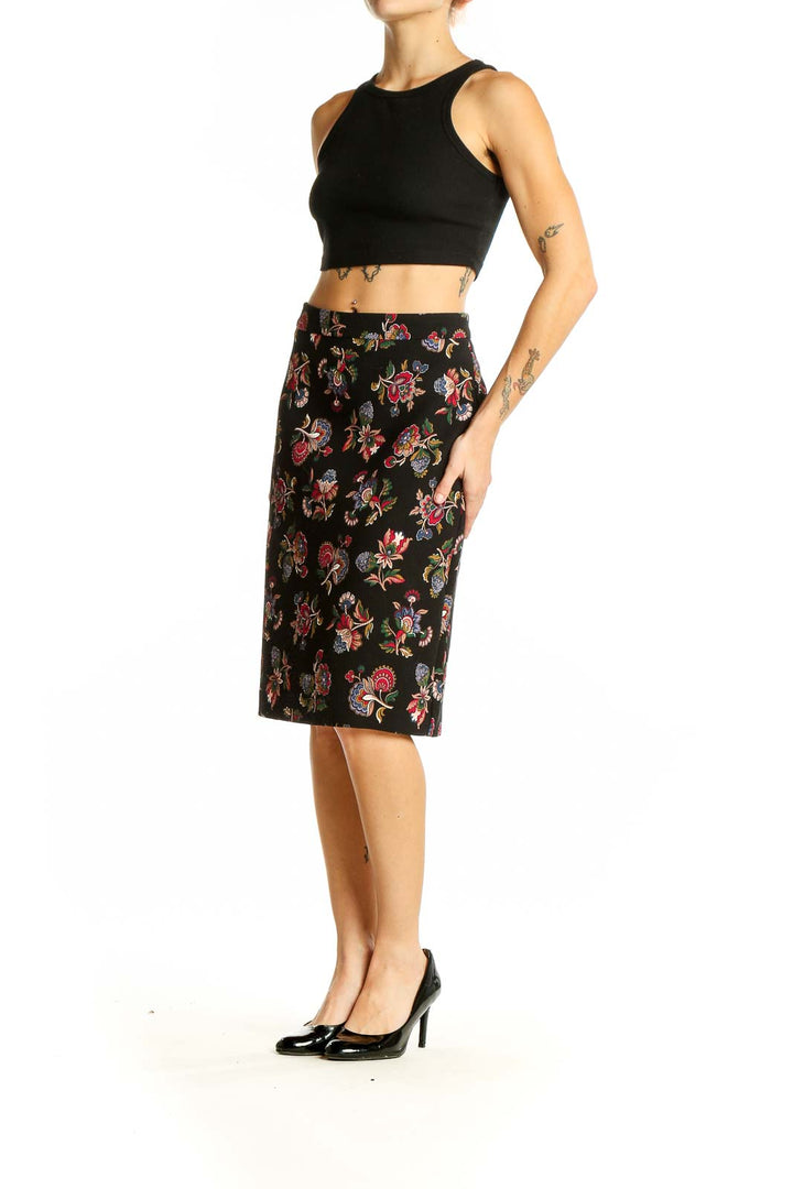 Front view of Ann Taylor black pencil skirt with colorful floral print