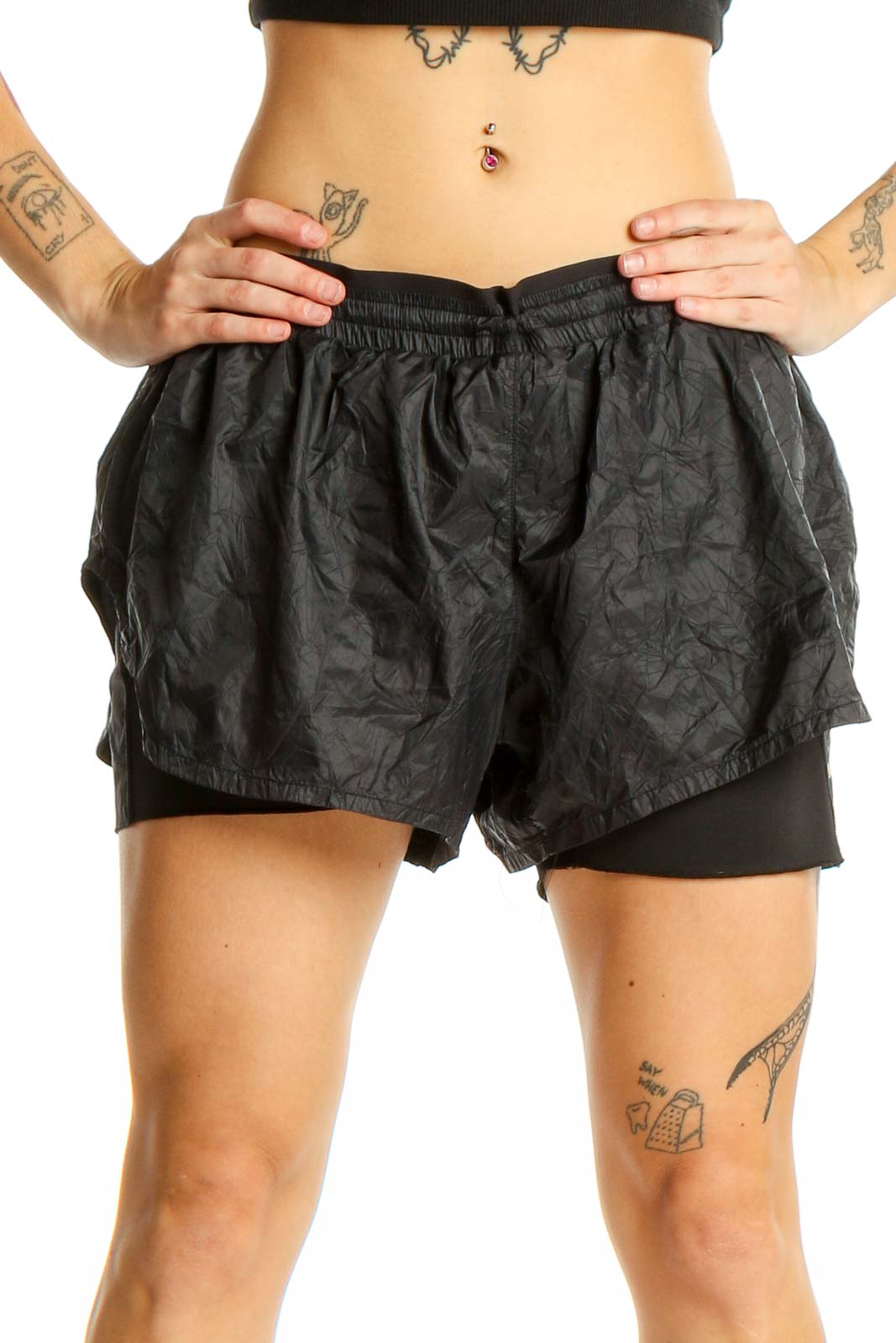 Front view of black Nike layered running shorts with crinkle-textured outer shell